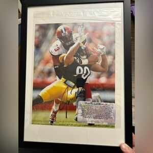 Joe Thomas Framed Autographed Football Photo with certificate of authenticity